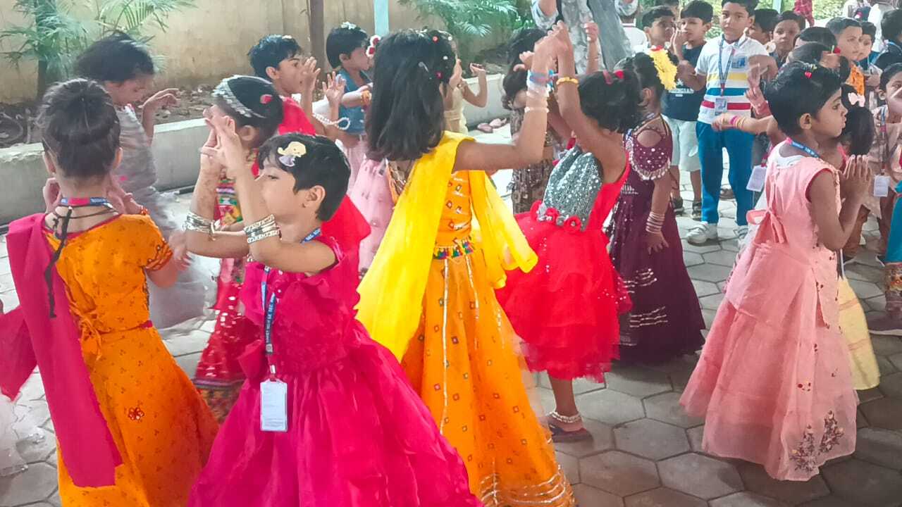 On the occasion of Navratri Garba celebration was done by Pre-primary students Let the rhythm of the dhol guide your steps